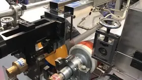 Línea compacta de recubrimiento y laminación por extrusión